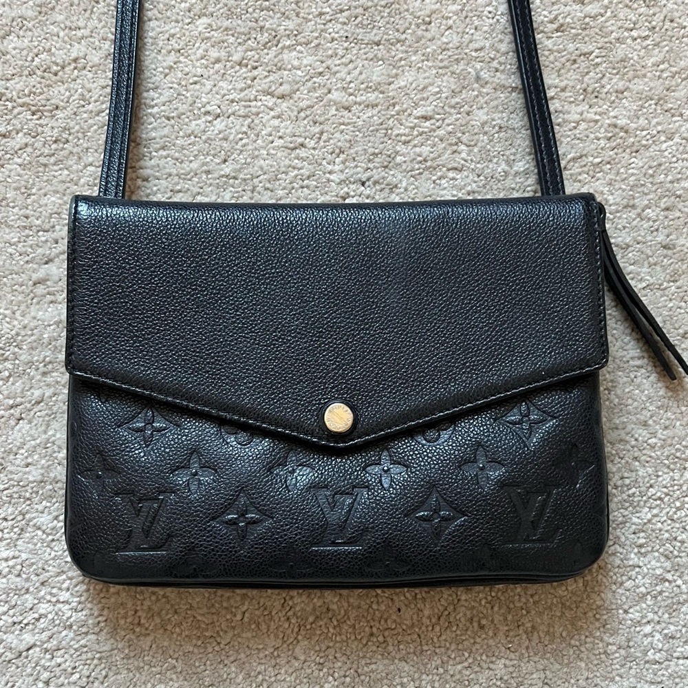 LOUIS VUITTON
Black Monogram Empreinte Leather Twice Crossbody Bag